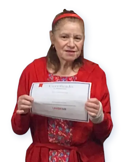 Older woman holding her certificate of completion for the Digital Skills for Life program.