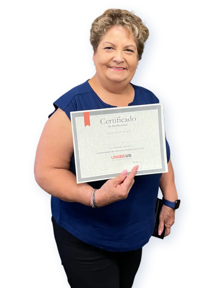 A participant in UnidosUS's Digital Skills for Life program proudly displaying their certificate of completion.